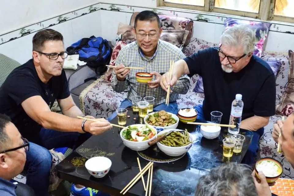 Sharing a meal with church leaders on a China Partner ministry trip