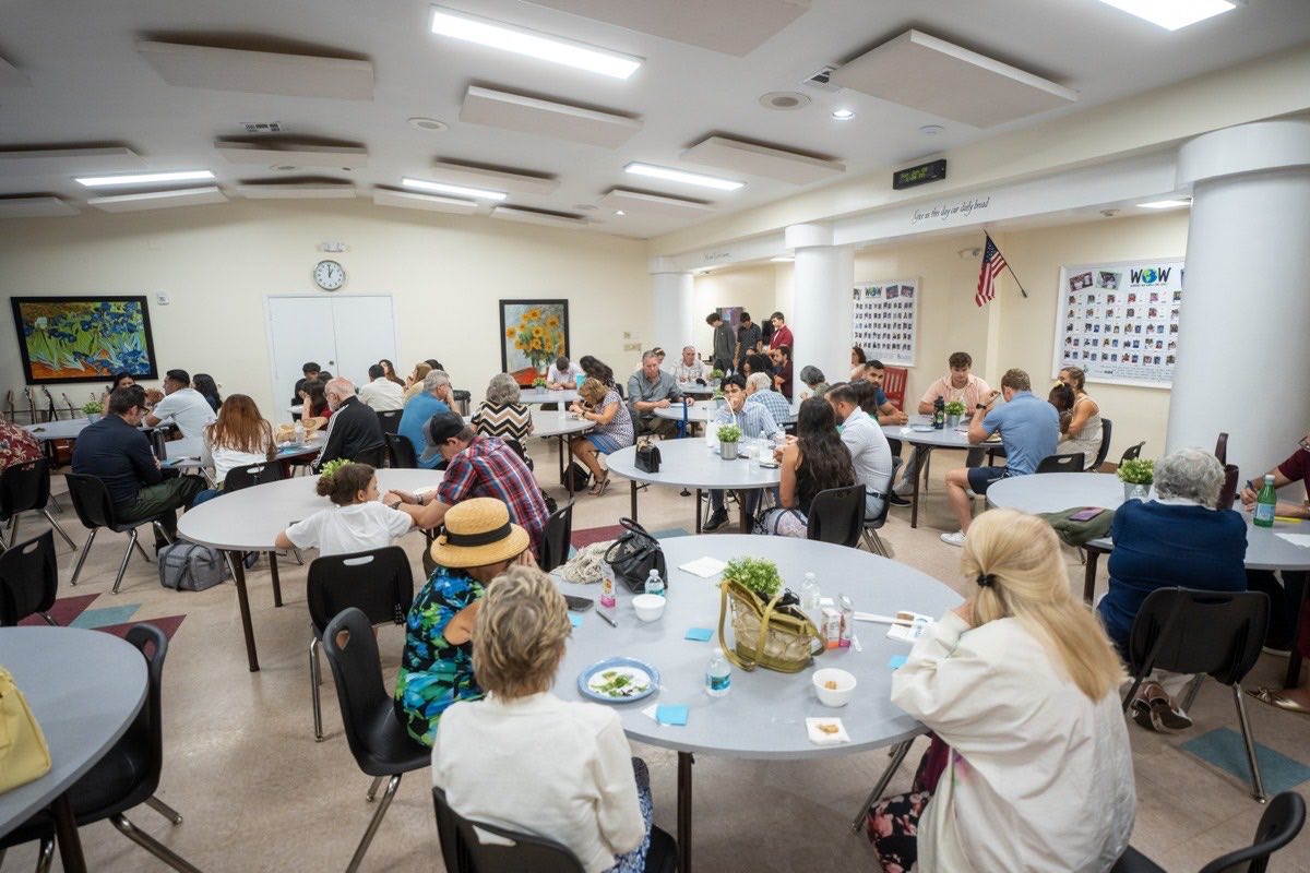 The congregation sharing a meal in the fellowship hall